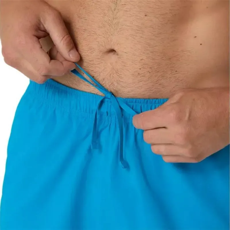 Short Asics Core 7IN Azul Egeo